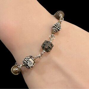 Handcrafted Mixed Metal Beaded Bracelet With Ornate Design
